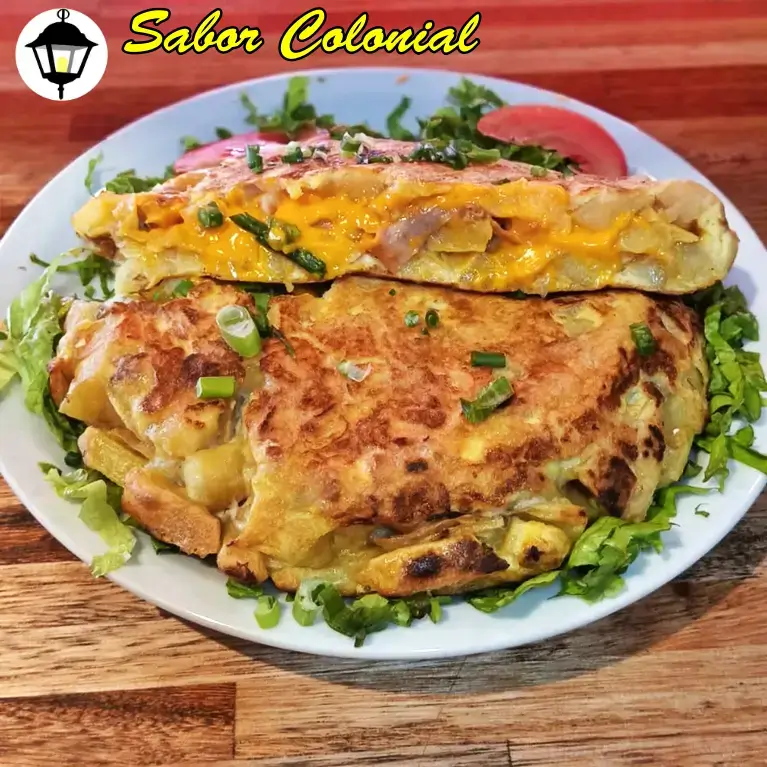 tortilla de papas rellena con queso cheddar panceta y cebolla de verdeo